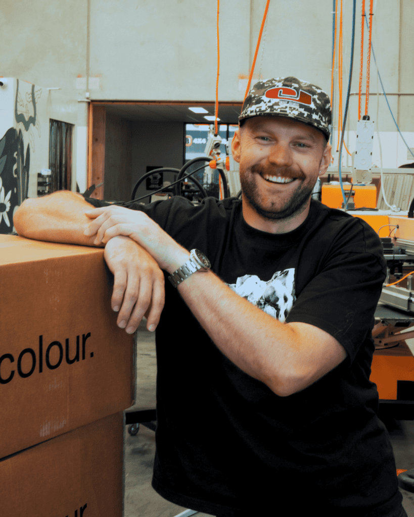 Portrait photo of Chris Benson at Cherry Studios. They provide screenprinting and embroidery services for merch, t-shirts and hoodies.