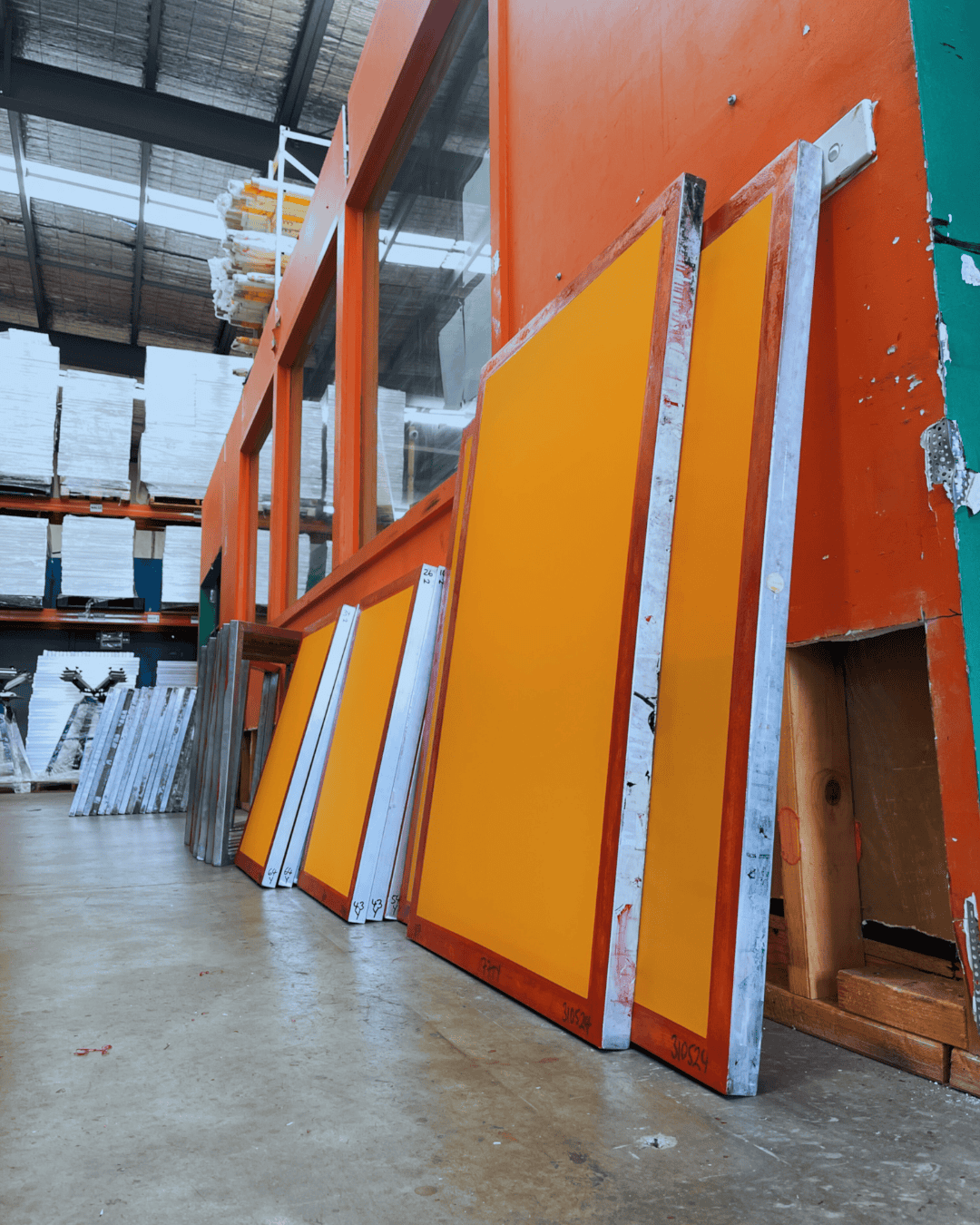 Additional screen re-meshing imagery showing finished screens and shop workflow